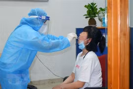 Vietnam logs 152 more COVID-19 cases, new outbreak found in HCM City