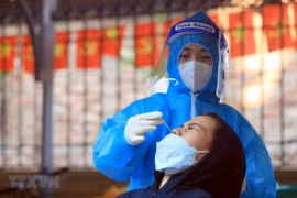 Vietnam reports 17,000 new COVID-19 cases on Dec. 30