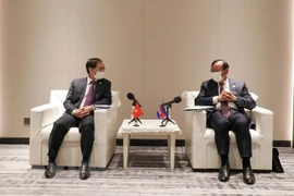 Foreign ministers satisfied with development trend in Vietnam-Cambodia ties