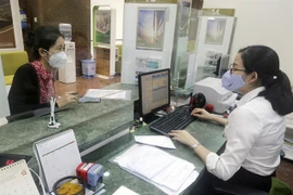 Credit institutions asked to tighten loans in “overheating” sectors: SBV