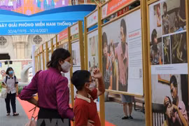 Exhibition on AO/dioxin pain, lawsuit underway in HCM City