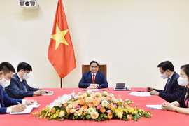 PM proposes WHO support and prioritise vaccine delivery to Vietnam