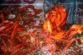 Kitchen Gods ceremony a tradition of Tet