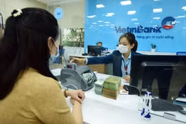 Reference exchange rate down 7 VND 