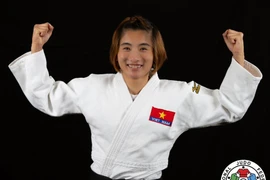 Female judoka Hoang Thi Tinh is the latest to win tickets for Vietnam to the Paris 2024 Olympics (Photo: VNA)