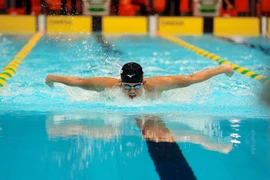 Swimmer Nguyen Quang Thuan wins a gold medal at men's 200m butterfly event (Photo: VNA)