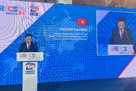 Nguyen Minh Tam, deputy head of the Party Central Committee’s Commission for External Relations, speaks at the event. (Photo: VNA)