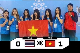 Vietnamese team pose for photo after first win at the Asian Esports Games 2024 on November 25 in Thailand. (Photo: VIRESA) 