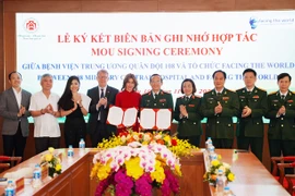 At the MoU signing ceremony (Photo: VNA)