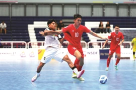Nguyen Thinh Phat of Vietnam seen in action during the Vietnam vs Timor Leste match of the ASEAN Futsal Championship 2024 on November 2 in Thailand. Vietnam win 4-1 (Photo: VNA)