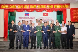 The steering committee for the search, collection, identification of fallen soldiers’ remains of the southern province of Tay Ninh on November 6 signs an agreement to coordinate the search and repatriation of martyrs’ remains during the 2024–2025 dry season with the specialised committees of five provinces of Cambodia. (Photo: VNA)