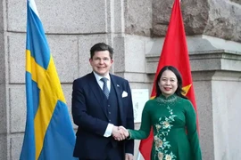 Speaker of the Riksdag Andreas Norlén (L) welcomes State Vice President of Vietnam Vo Thi Anh Xuan. (Photo: VNA)