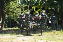  Laos, China hold joint humanitarian, medical rescue drill