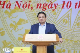 Prime Minister Pham Minh Chinh presides over the first meeting of the Central Steering Committee for for the eradication of the temporary and dilapidated houses. (Photo: VNA)