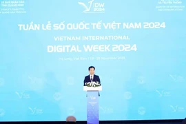 Minister of Information and Communications Nguyen Manh Hung speaks at the event. (Photo: VNA)