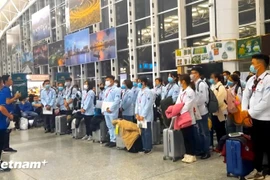 Labourers taking a Korean test before travelling to the RoK for working (Photo: VietnamPlus