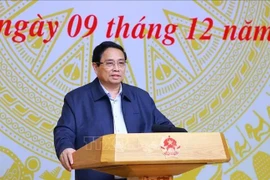 Prime Minister Pham Minh Chinh, who is also Chairman of the Central Emulation and Commendation Council, chairs its 10th meeting Hanoi on December 9. (Photo: VNA)