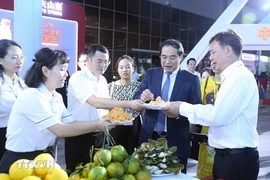 People attend the China–Vietnam Border Economic, Trade and Tourism Fair held in 2023 in the northern province of Lao Cai. (Photo: VNA)