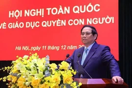 Prime Minister Pham Minh Chinh addresses the conference (Photo: VNA)