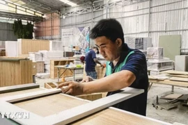 Furniture production at Manh He Furniture Company Limited, Ho Chi Minh City. (Photo: VNA)