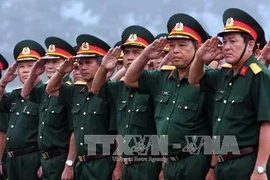 The characteristics of Vietnam’s national defence is based on all people, peaceful, and self-defence and to actively, proactively, resolutely and perseveringly prevent risks of war. (Photo: VNA)