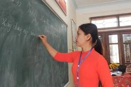 The Ministry of Education and Training is making efforts to finalise the draft Teachers’ Law. (Photo: VietnamPlus)