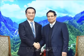 PM Pham Minh Chinh (R) and Yamaguchi Governor Muraoka Tsugumasa (Photo: VNA)