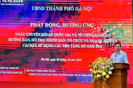 Deputy Chairman of the Hanoi People's Committee Ha Minh Hai speaks at the event. (Photo: VNA)