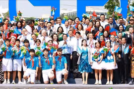 Prime Minister Pham Minh Chinh and participants at the event (Photo: VNA)