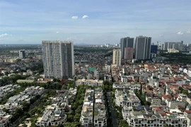 Thorough consideration is needed to ensure legal compliance and investor safety of the joint real estate investment model in Vietnam. (Photo: VNA)