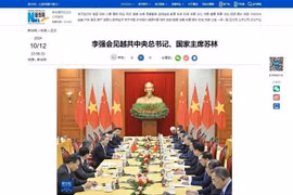 Xinhua reports on the meeting between Vietnamese Party General Secretary and President To Lam and Chinese Premier Li Qiang. (Photo: VNA)