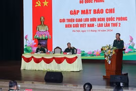 A press conference is held on October 15 to announce the second Vietnam-Laos border defence friendship exchange. (Photo: VNA)