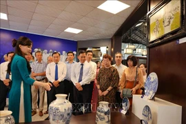 The exhibition of ceramic products and relevant images kicks off in Bat Trang pottery village in Hanoi on October 8. (Photo: VNA)