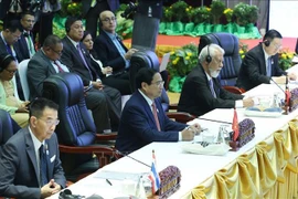 Prime Minister Pham Minh Chinh (second, left front) attends the 12th ASEAN-US Summit in Vientiane on October 11. (Photo: VNA)