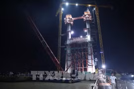 Work at Rach Mieu 2 that connects Tien Giang and Ben Tre provinces. (Photo: VNA)