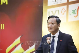 Vietnamese Ambassador to Laos Nguyen Minh Tam addresses the event. (Photo: VNA)
