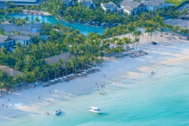 Kem Beach in the South of Phu Quoc Island with wide, gentle and creamy white sand is considered a tropical paradise.