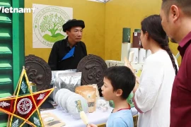 Dao ethnic man embracing digital transformation