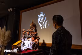 Portrait of Party leader illuminated through light sculpture