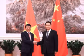 Vietnamese Minister of Public Security Sen. Lieut. Gen. Luong Tam Quang (L) and his Chinese counterpart Wang Xiaohong (Photo: VNA)