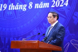 Prime Minister Pham Minh Chinh addresses the conference (Photo: VNA)