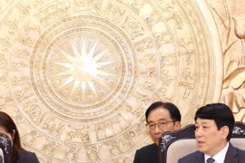 Politburo member and standing member of the Party Central Committee's Secretariat Luong Cuong (R) and Portuguese Communist Party General Secretary Paulo Raimundo at their meeting in Hanoi on August 16. (Photo: VNA)