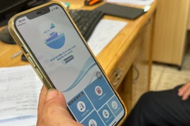 The Ministry of Agriculture and Rural Development has asked all fishing ports to control vessels and monitor seafood output through the app from July 1. (Photo: VNA)