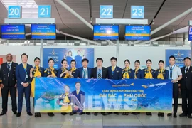 At the ceremony marking the launch of the inaugural flight on Vietravel Airlines' Taipei-Phu Quoc route. (Photo: VNA)