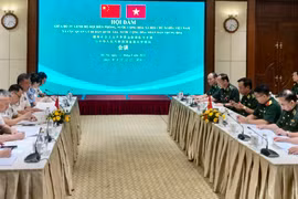 At the talks between the Vietnam Border Guard High Command and the National Immigration Administration of China in Hanoi on August 12. (Photo: VNA)