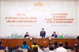 At the press conference announcing the results of the 8th extraordinary session of the 15th NA on August 26. (Photo: VNA)