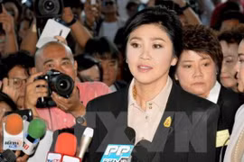 Thailand: former PM Yingluck to pay for rice scheme 