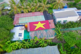 People transform roof into a national flag to celebrate National Day