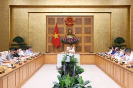 Deputy PM Tran Hong Ha chairs the conference on May 27. (Photo: VNA)