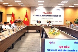 The VietNamNet online newspaper co-ordinated with the Vietnam Telecommunications Authority (VNTA) under the Ministry of Information and Communications to organise a discussion on turning off 2G waves on July 18. (Photo: nld.com.vn)